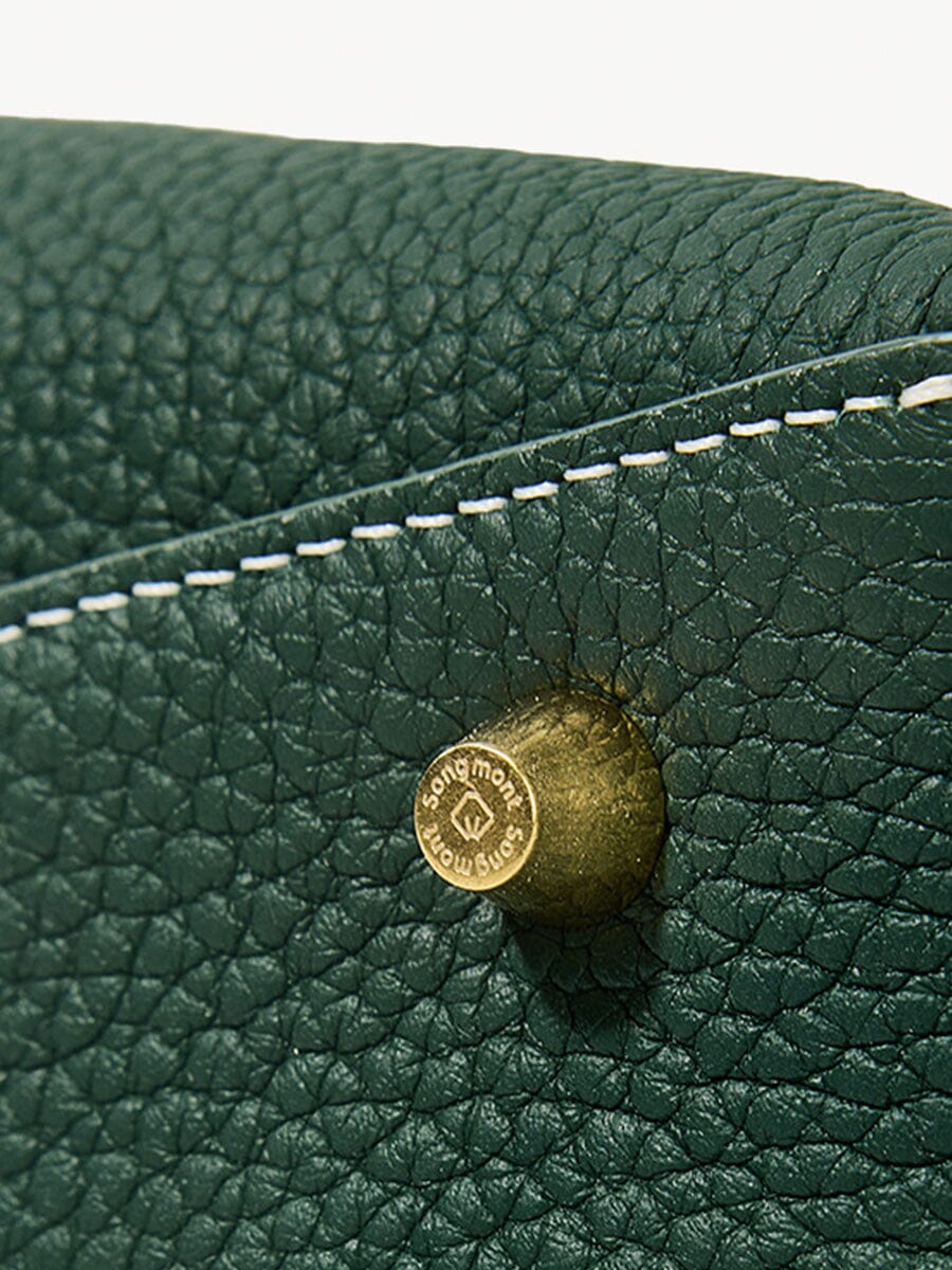 Songmont Small Drippy Roof Bag Emerald - close-up of gold stud on pebbled leather