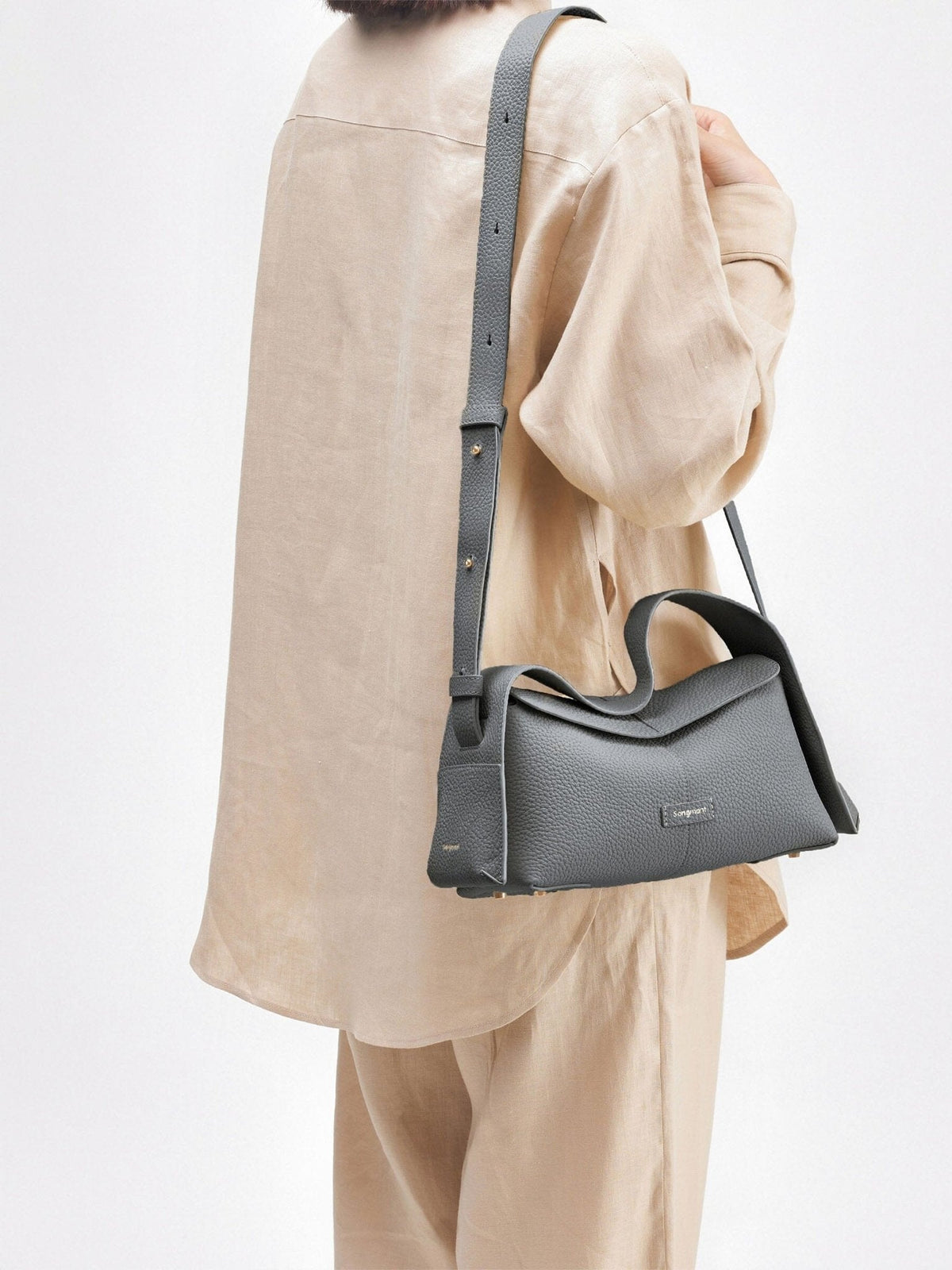 Songmont Small Drippy Roof Bag Stardust - worn crossbody, back view