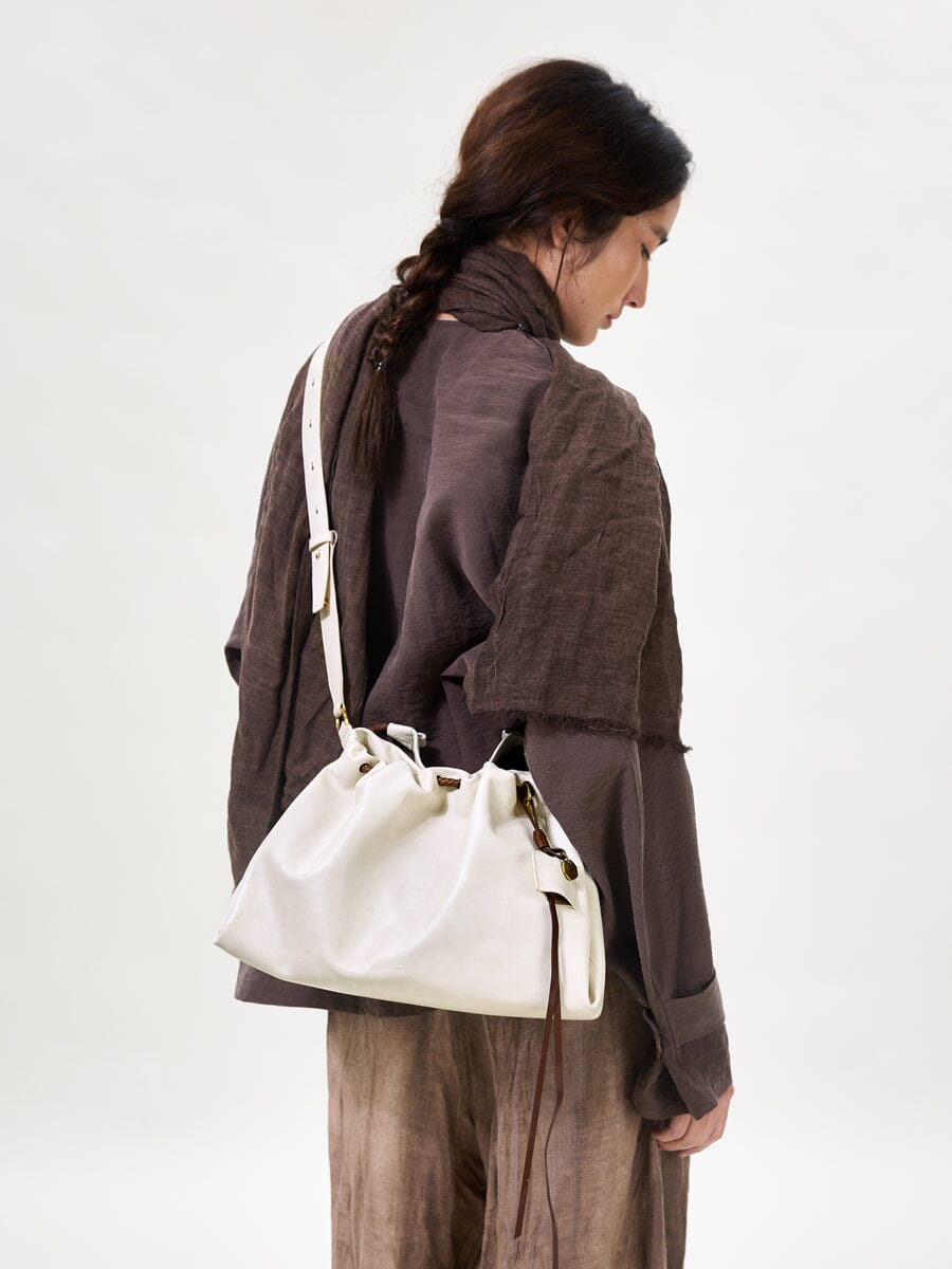 Songmont Small Gather Bag Cloud - worn cross-body, back view