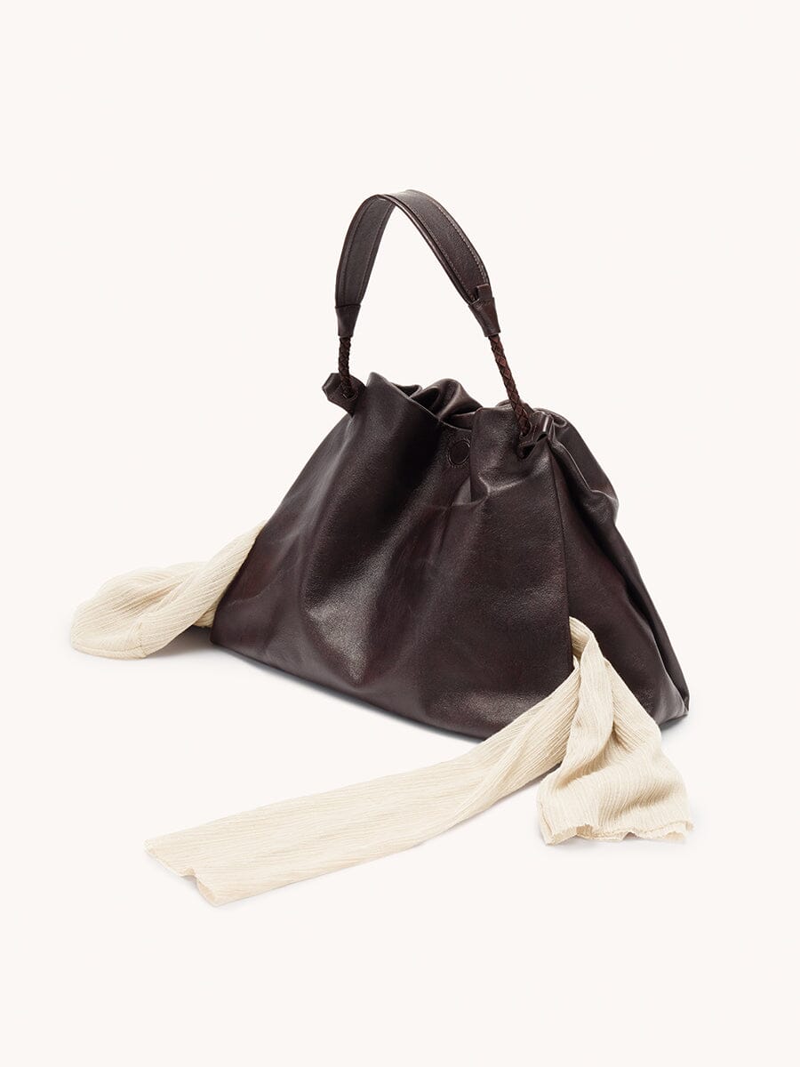 Songmont Small Gather Bag Ebony - styled with a cream scarf