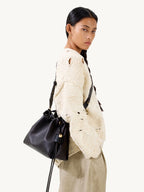 Songmont Small Gather Bag Ebony - worn cross-body, side view