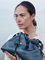 Songmont Small Gather Bag Navy - held close, front view
