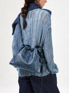 Songmont Small Gather Bag Navy - worn cross-body, back view