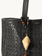 Songmont Small Lattice Tote Onyx - strap and weave close-up