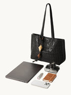 Songmont Small Lattice Tote Onyx - flat lay with laptop and essentials