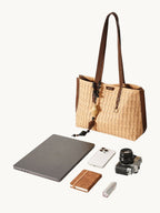 Songmont Small Lattice Tote Sulfur - flat lay with laptop and essentials
