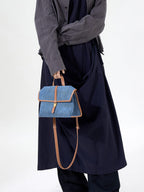 Songmont Small Shan Satchel Bag Denim carried by the top handle