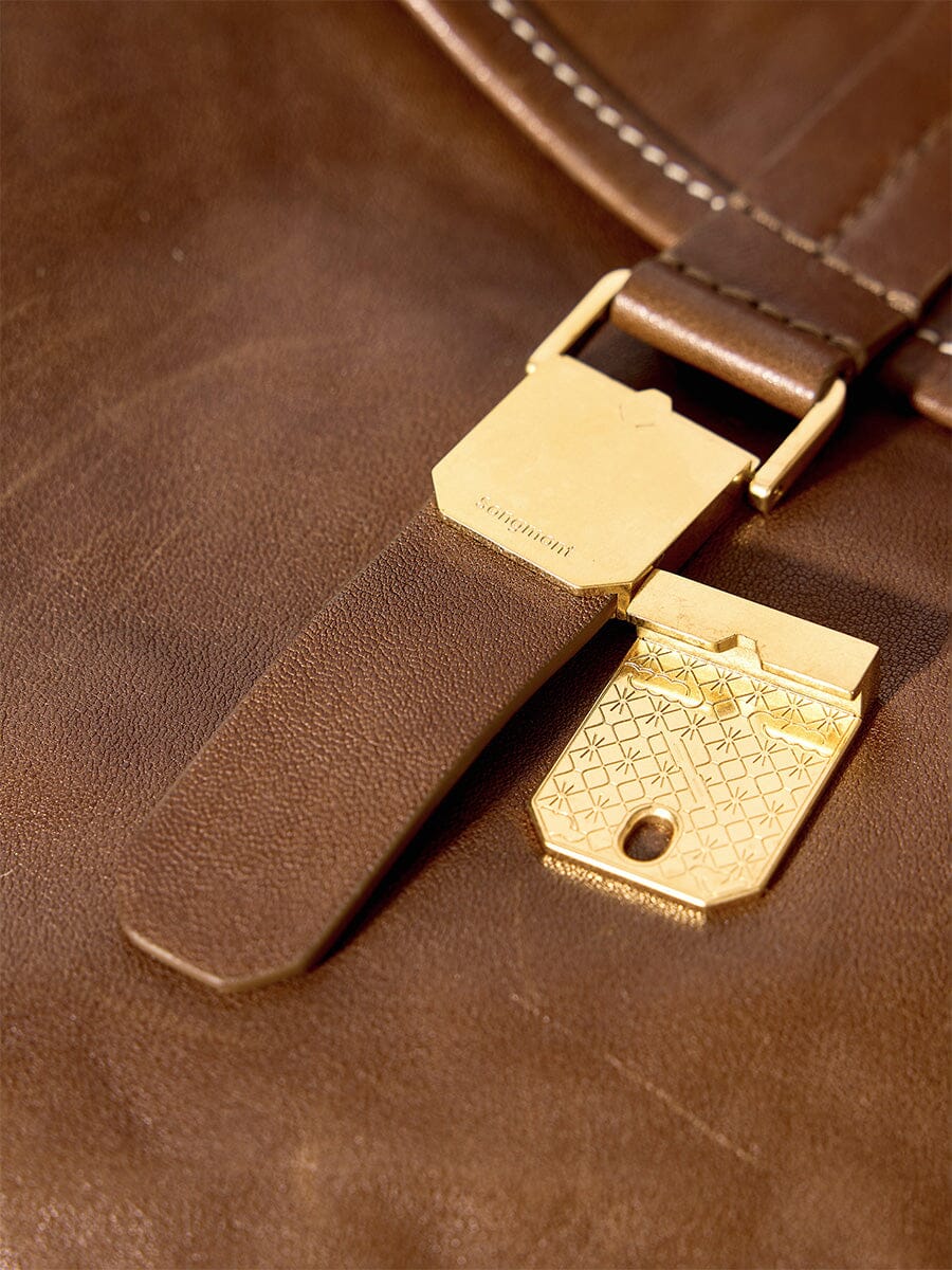 Songmont Small Shan Satchel Bag Sandal engraved clasp close-up