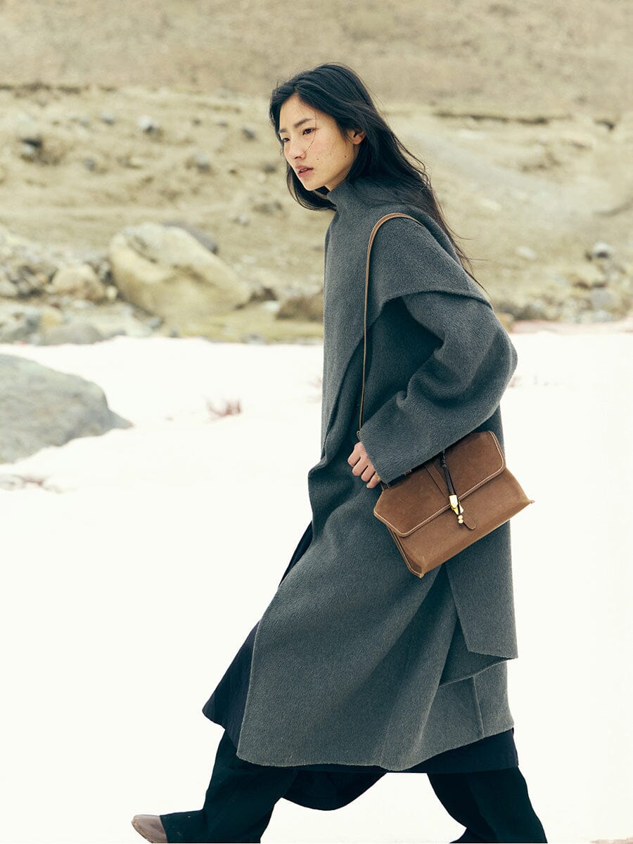 Songmont Small Shan Satchel Bag Sandal worn with grey coat