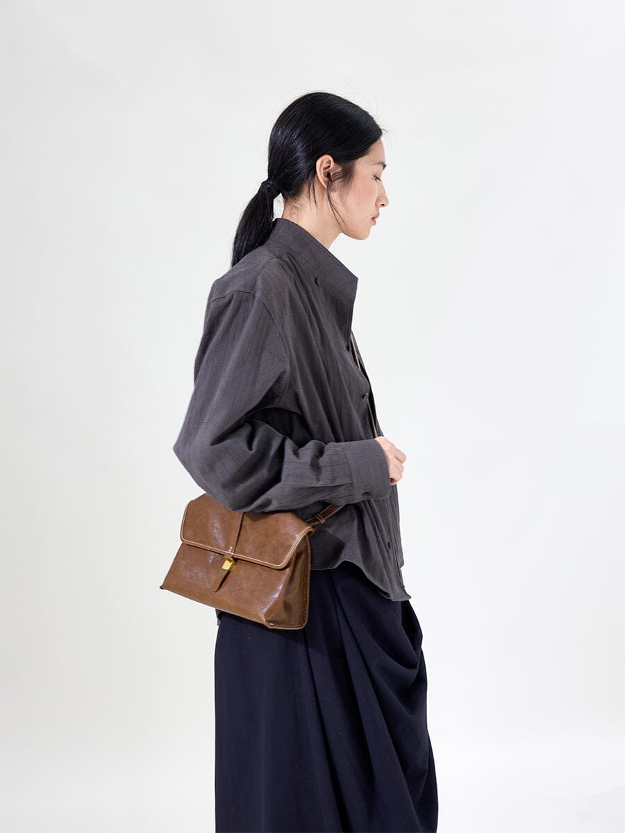 Songmont Small Shan Satchel Bag Sandal strap and flap detail