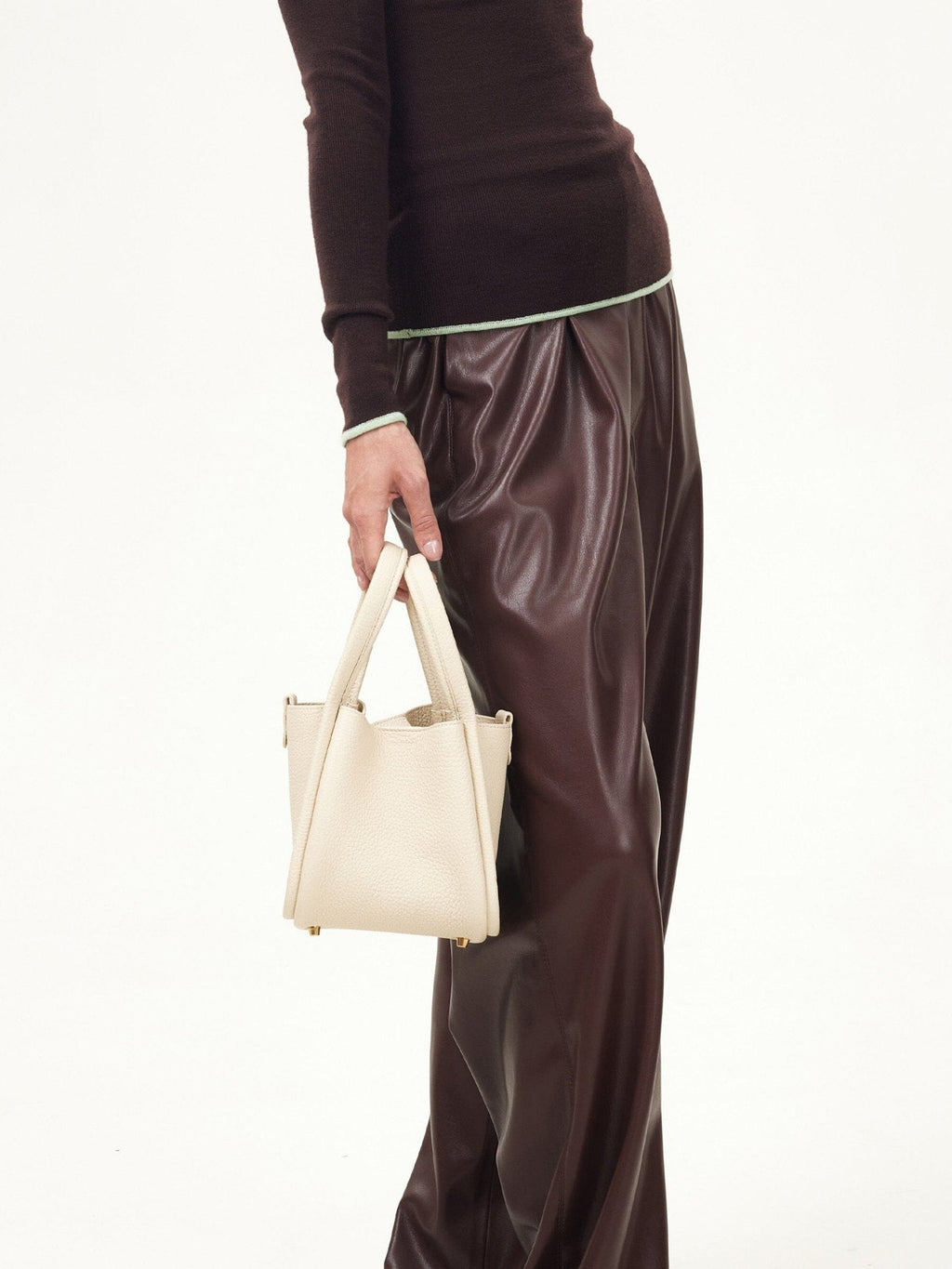 Songmont Small Song Bag Ivory - held at the side by the top handles