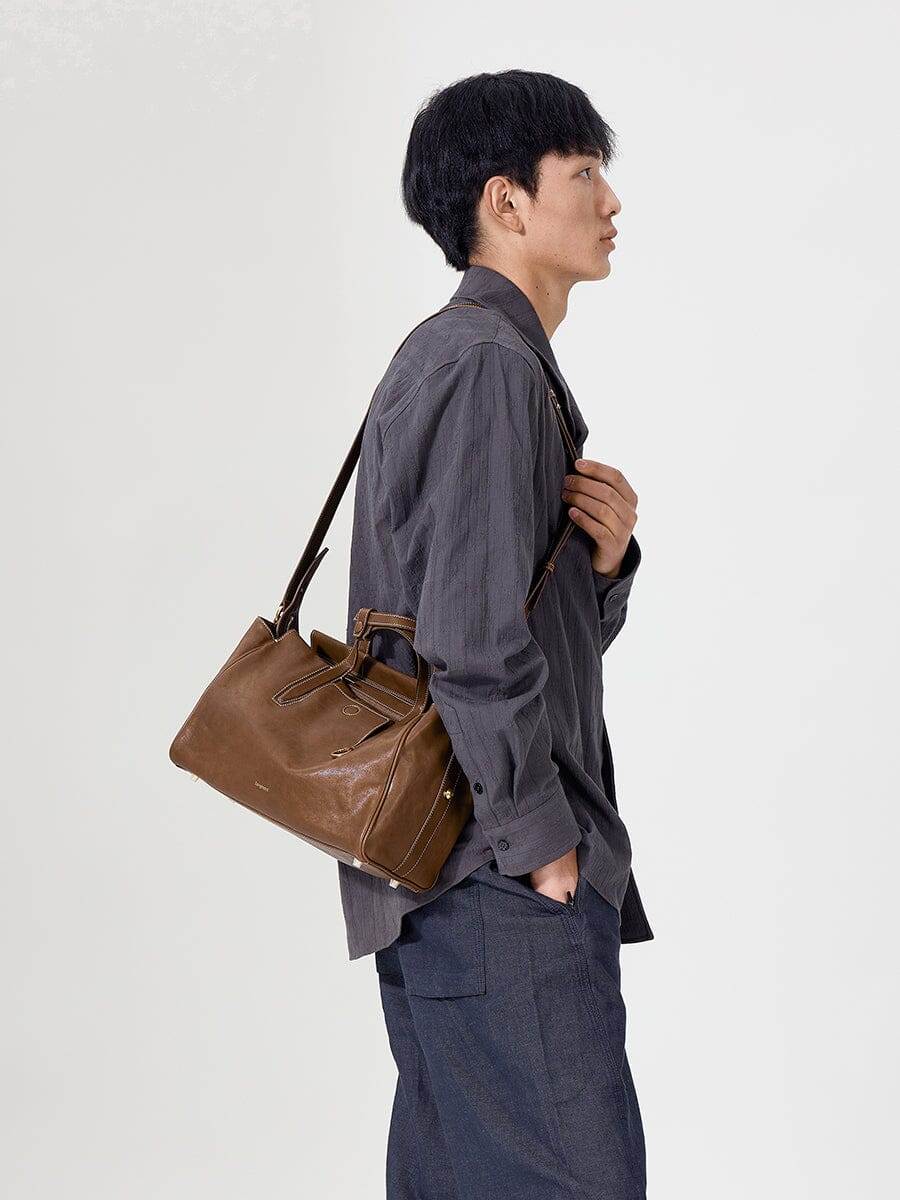 Songmont Small Yore Duffle Bag Sandal - worn on the shoulder, side view