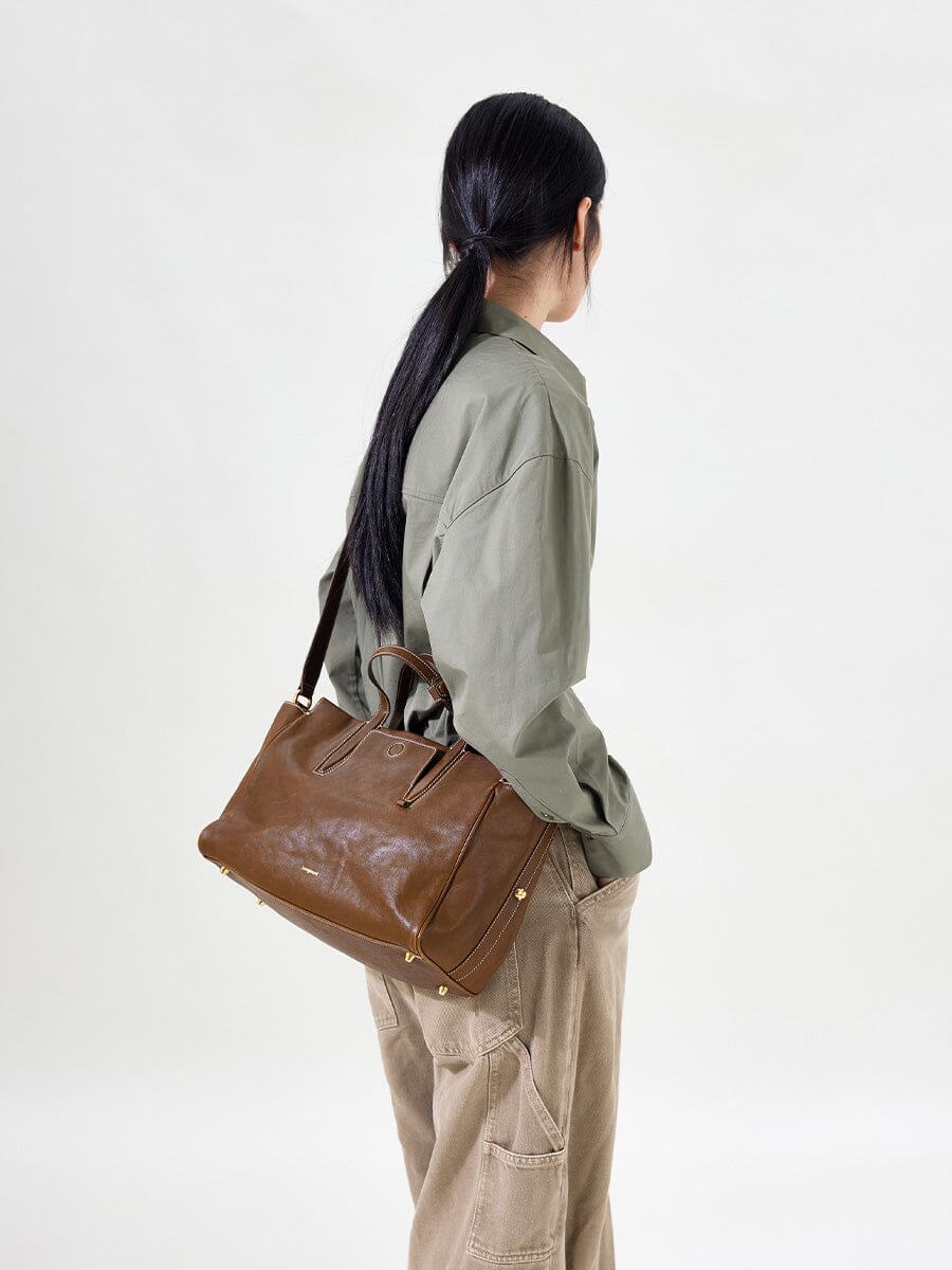 Songmont Small Yore Duffle Bag Sandal - worn crossbody, back view