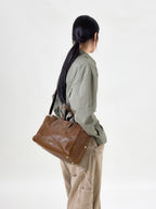Songmont Small Yore Duffle Bag Sandal - worn crossbody, back view