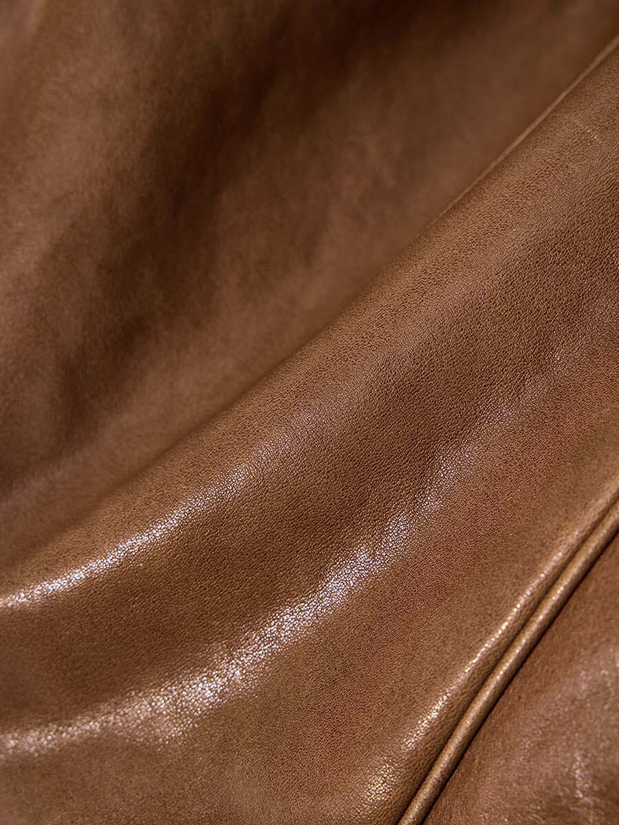 Songmont Small Yore Duffle Bag Sandal - close-up of glossy tan leather