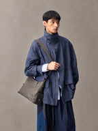 Songmont Small Yore Hobo Bag Ink Grey worn crossbody