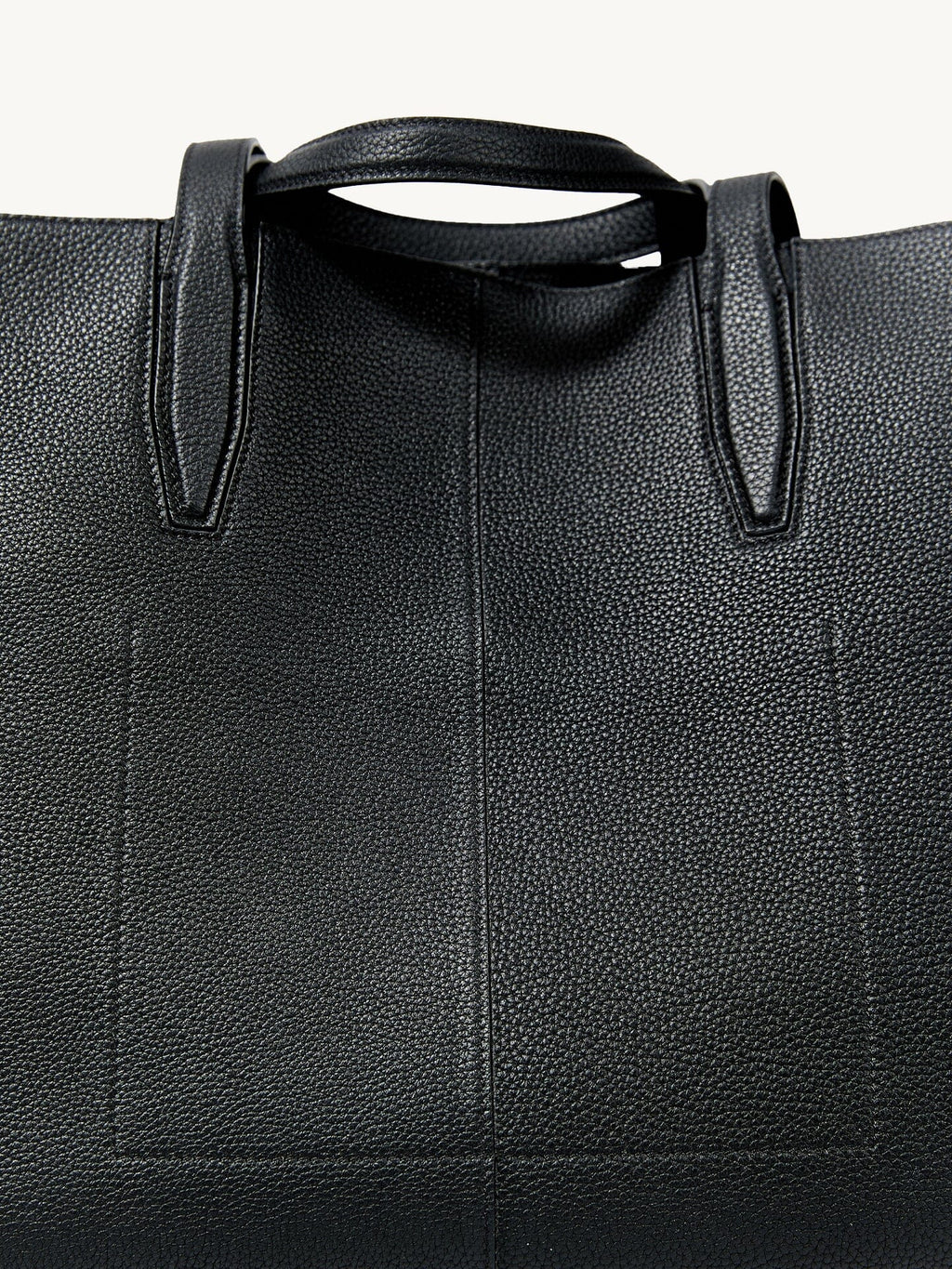 Songmont Small Yore Tote Bag Onyx - close-up of the top handle and stitched leather