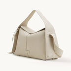 Songmont Drippy Roof Bag Ivory - cream full-grain leather shoulder bag, three-quarter view