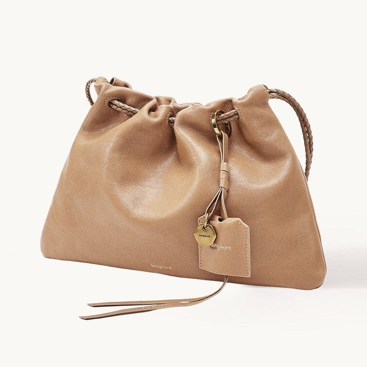 Songmont Gather City Pouch Set Earth - sandy tan leather drawstring clutch, front view