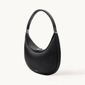 Songmont Luna Bag Onyx - black leather crescent bag with silver-tone hardware