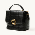 Songmont Medium Chocolate Bag Onyx - quilted black flap bag with gold clasp and top handle