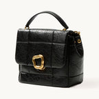 Songmont Medium Chocolate Bag Onyx - quilted black flap bag with gold clasp and top handle