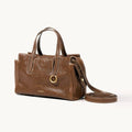 Songmont Mini Yore Duffle Bag Sandal - brown leather bag with top handles and strap