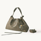Songmont Small Gather Bag Dark Pine Green front view with strap