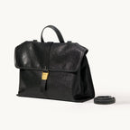 Songmont Small Shan Backpack Onyx - black leather backpack with book clasp and strap