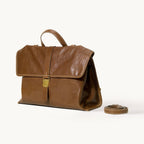 Songmont Small Shan Backpack Sandal - tan brown leather backpack with book clasp and strap