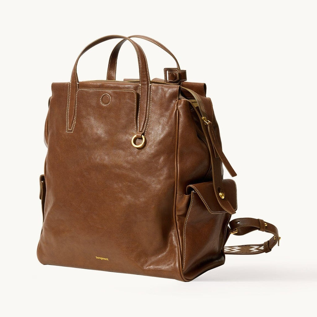 Songmont Small Yore Backpack Sandal - chestnut brown leather backpack, three-quarter view