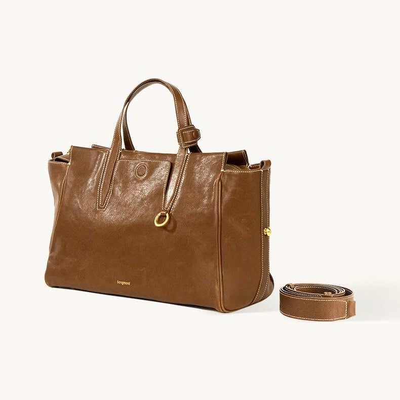 Songmont Small Yore Duffle Bag Sandal - tan leather duffle with white stitching and strap
