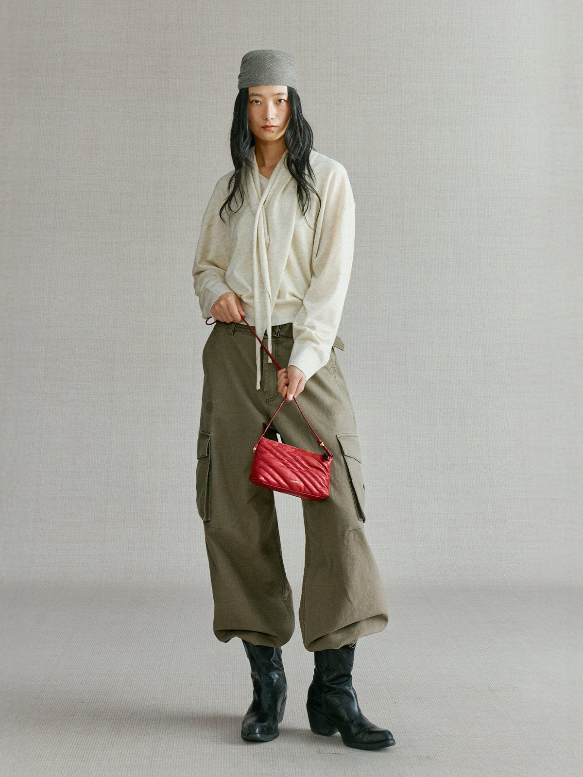 Songmont Winding Underarm Bag Lucky Red - full-length styling with cream knit and boots