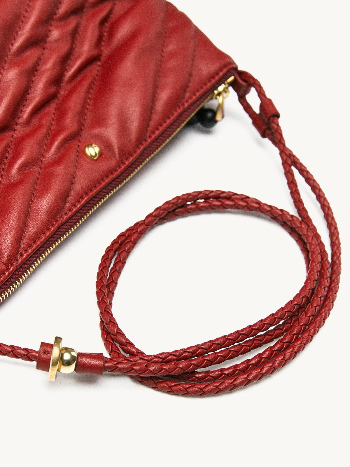 Songmont Winding Underarm Bag Lucky Red - braided strap coiled beside the zip corner