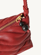 Songmont Winding Underarm Bag Lucky Red - zip pull with dark beads and strap join