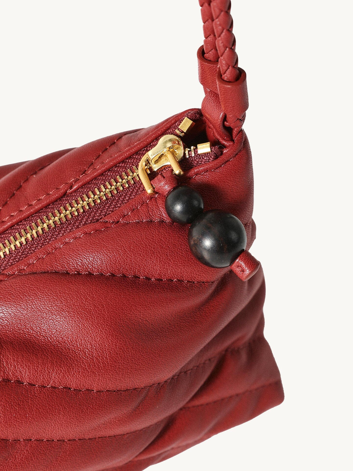 Songmont Winding Underarm Bag Lucky Red - zip pull with dark beads and strap join