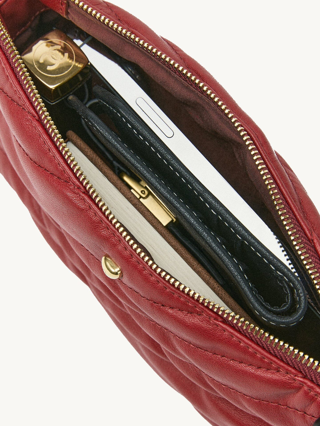 Songmont Winding Underarm Bag Lucky Red - open interior holding phone, wallet and notebook