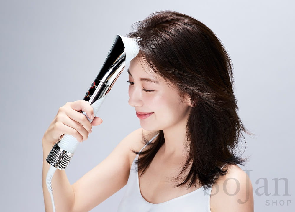 Drying hair with a ReFa hair dryer after ReFa Volume Lock 100ml