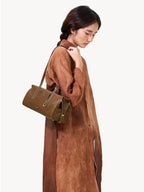 Songmont Yore Baguette Bag Sandal styled on the shoulder