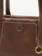 Songmont Yore Baguette Bag Sandal tiger-tooth pocket detail