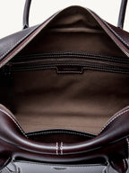 Songmont Yore Toast Bag Ebony - open interior with brown fabric lining